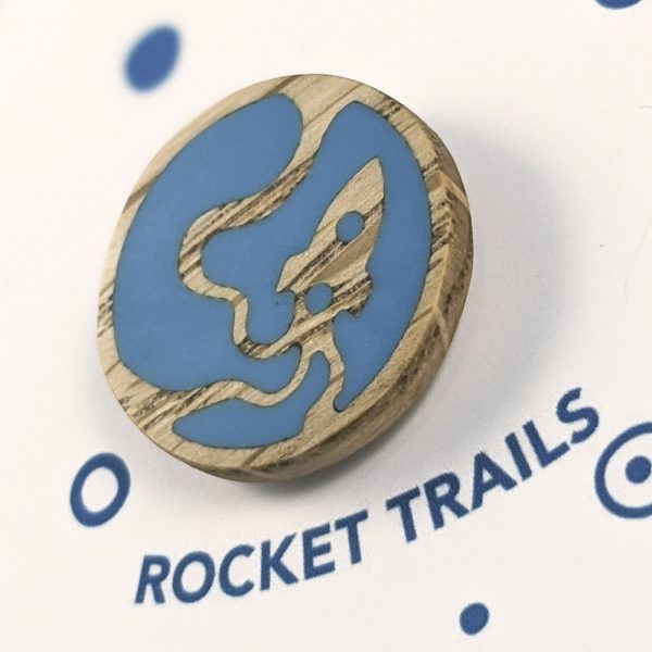 Rocket trails wooden pin badge